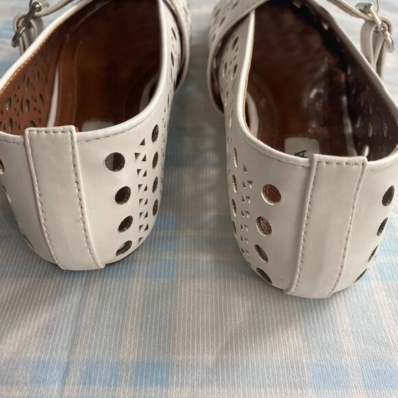 Alaïa's White, Hollowed-Out Leather Shoes Feature A Circular Upper And A Single- - Picture 4 of 7